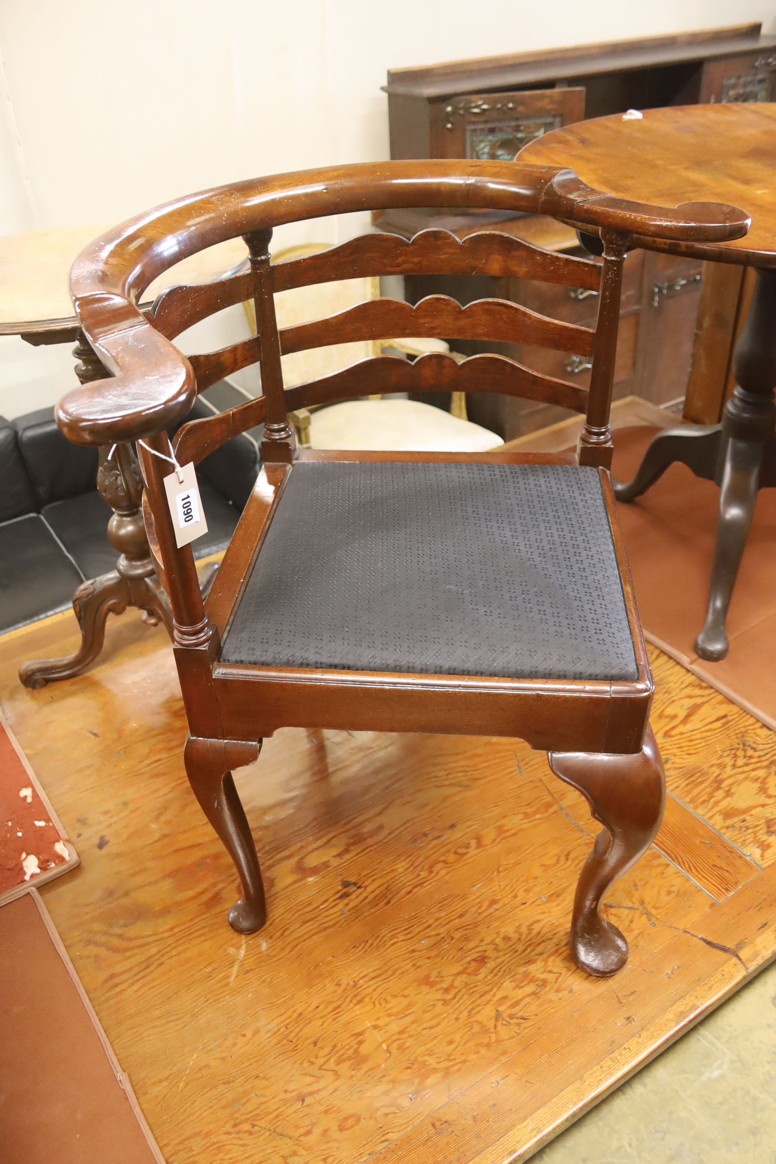 A George II corner elbow chair, width 76cm, depth 62cm, height 80cm